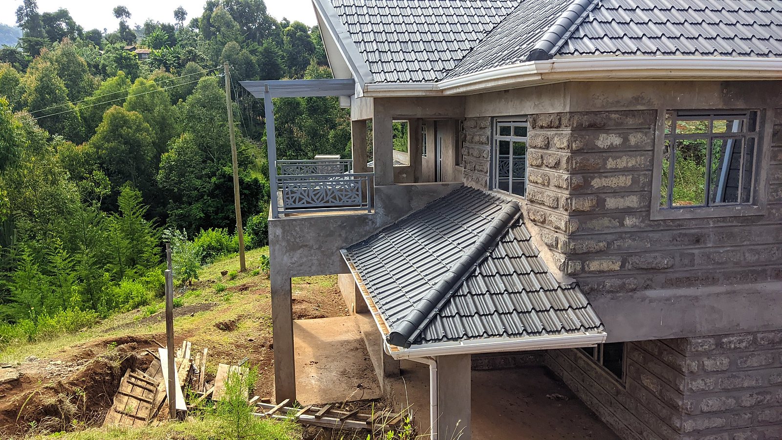House under construction on a sloping site