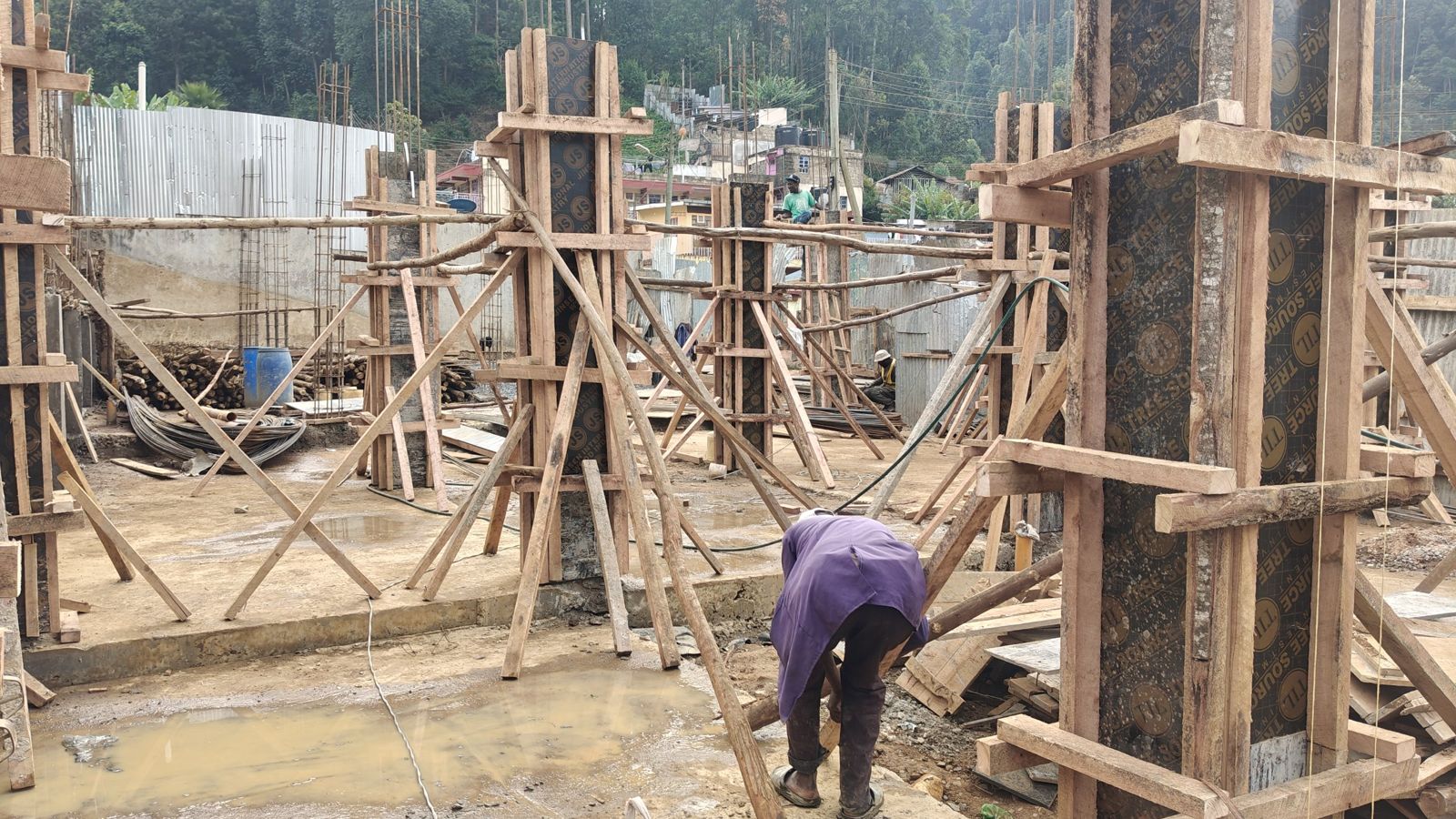 Column formwork and reinforcement at a construction site in Meru